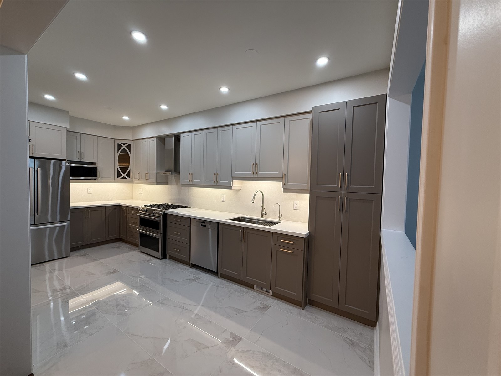 Open doorway view into the completed Oakville kitchen renovation